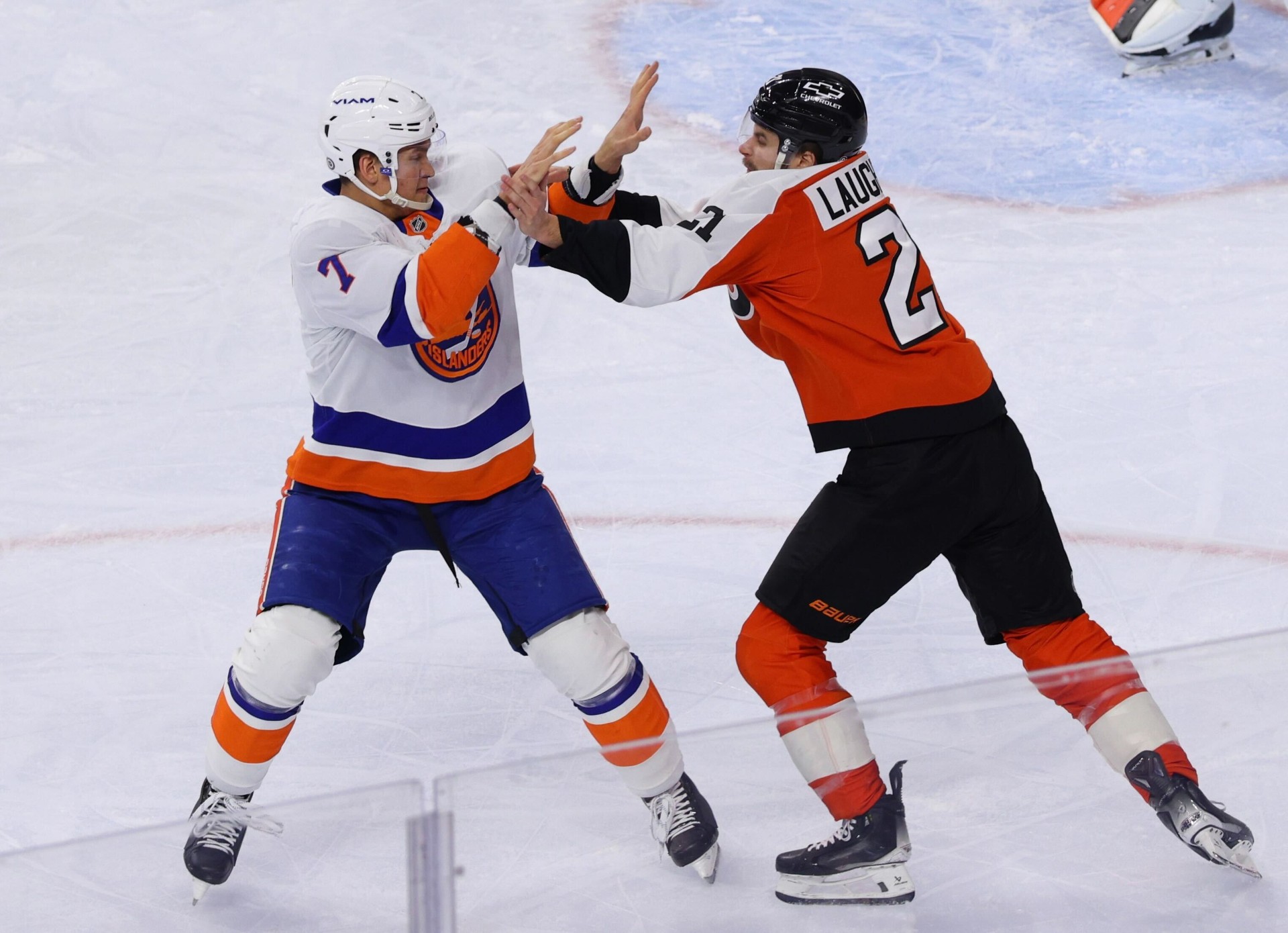 Philadelphia Flyers' Scott Laughton fights New York Islanders' Maxim Tsyplakov (Heather Cattai/Heather Barry Images, LLC)