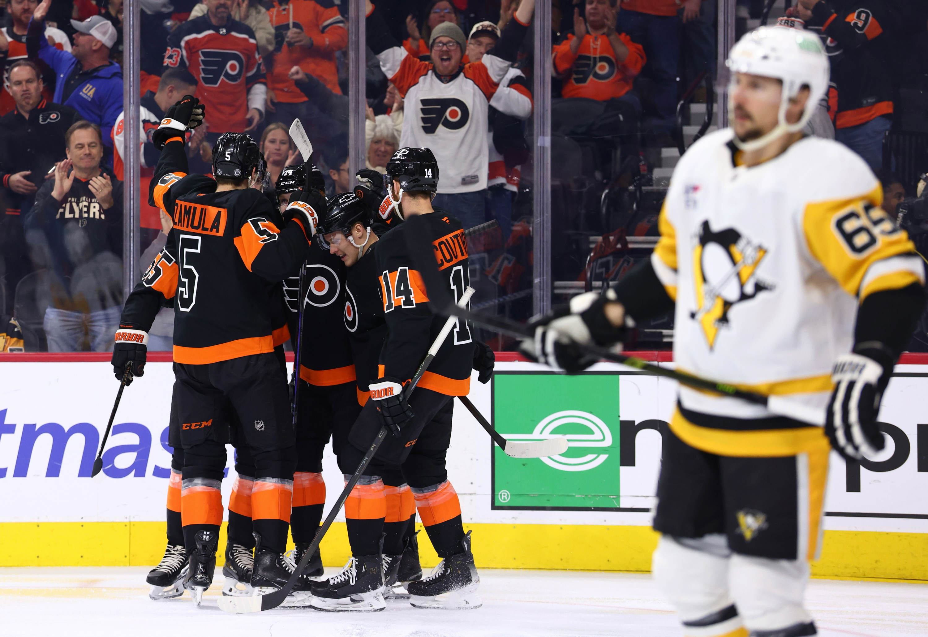 Philadelphia Flyers' Rasmus Ristolainen, Egor Zamula, Owen Tippett, Sean Couturier, and Matvei Michkov (Heather Cattai/Heather Barry Images, LLC)