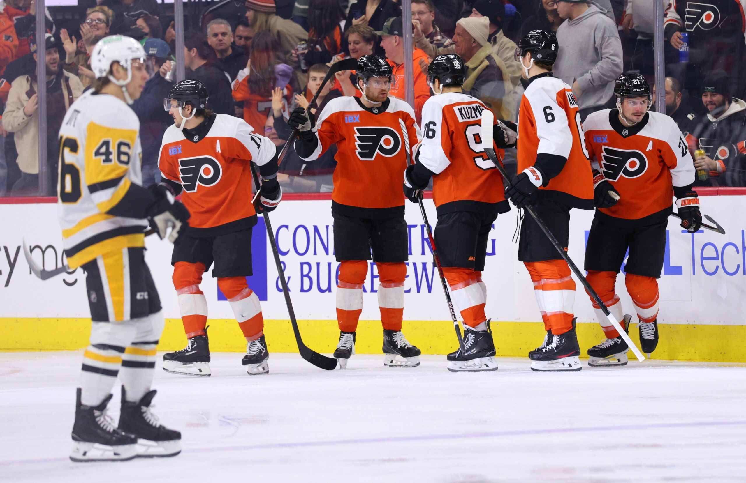 Philadelphia Flyers' Travis Konecny, Cam York, Andrei Kuzmenko, Travis Sanheim, and Scott Laughton celebrate a goal vs. the Pittsburgh Penguins (Heather Cattai/Heather Barry Images, LLC)